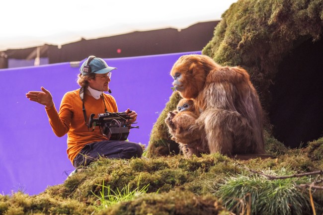THE LEGEND OF OCHI, director Isaiah Saxon with Ochi, on set, 2025. © A24 /Courtesy Everett Collection