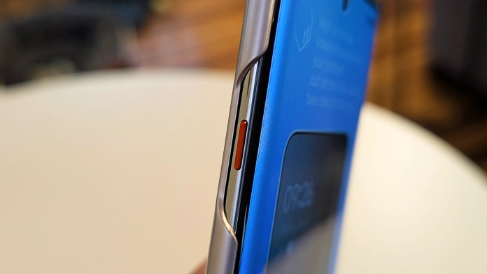 Close-up of the TECNO Camon 40 Pro 5G smartphone showcasing the side view with the One-Tap FlashSnap button.