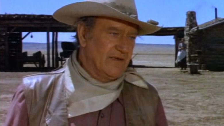 John Wayne in the movie Chisum in the movie Gremlins 2: The New Batch