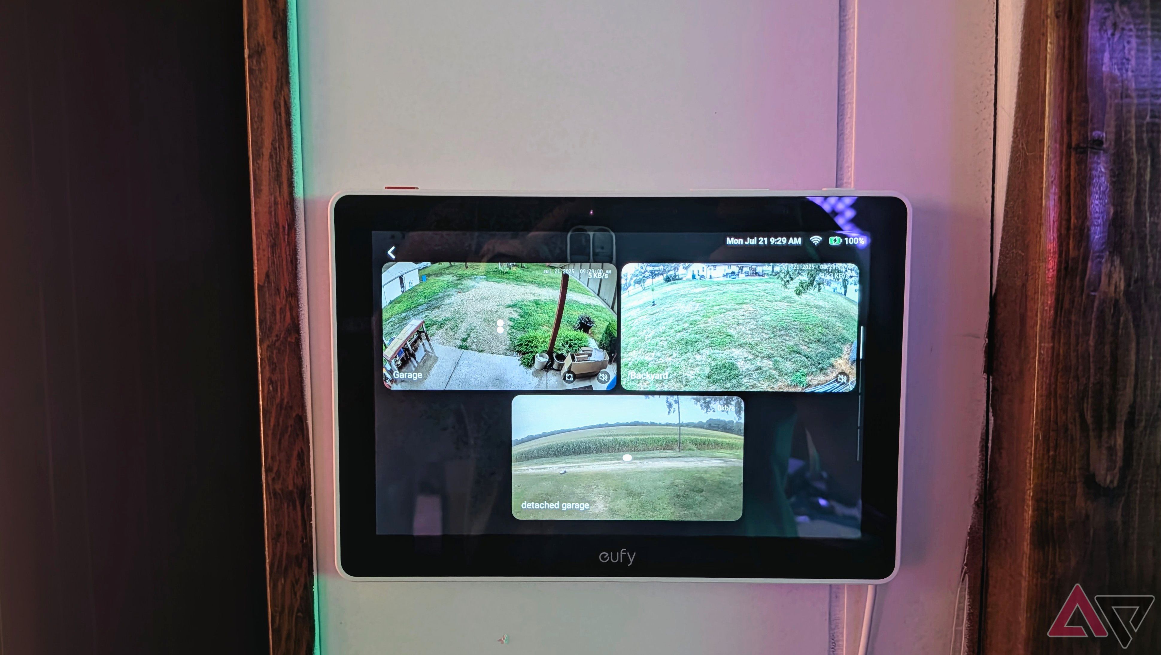 Eufy Smart Display E10 mounted on the wall showing three camera feeds.