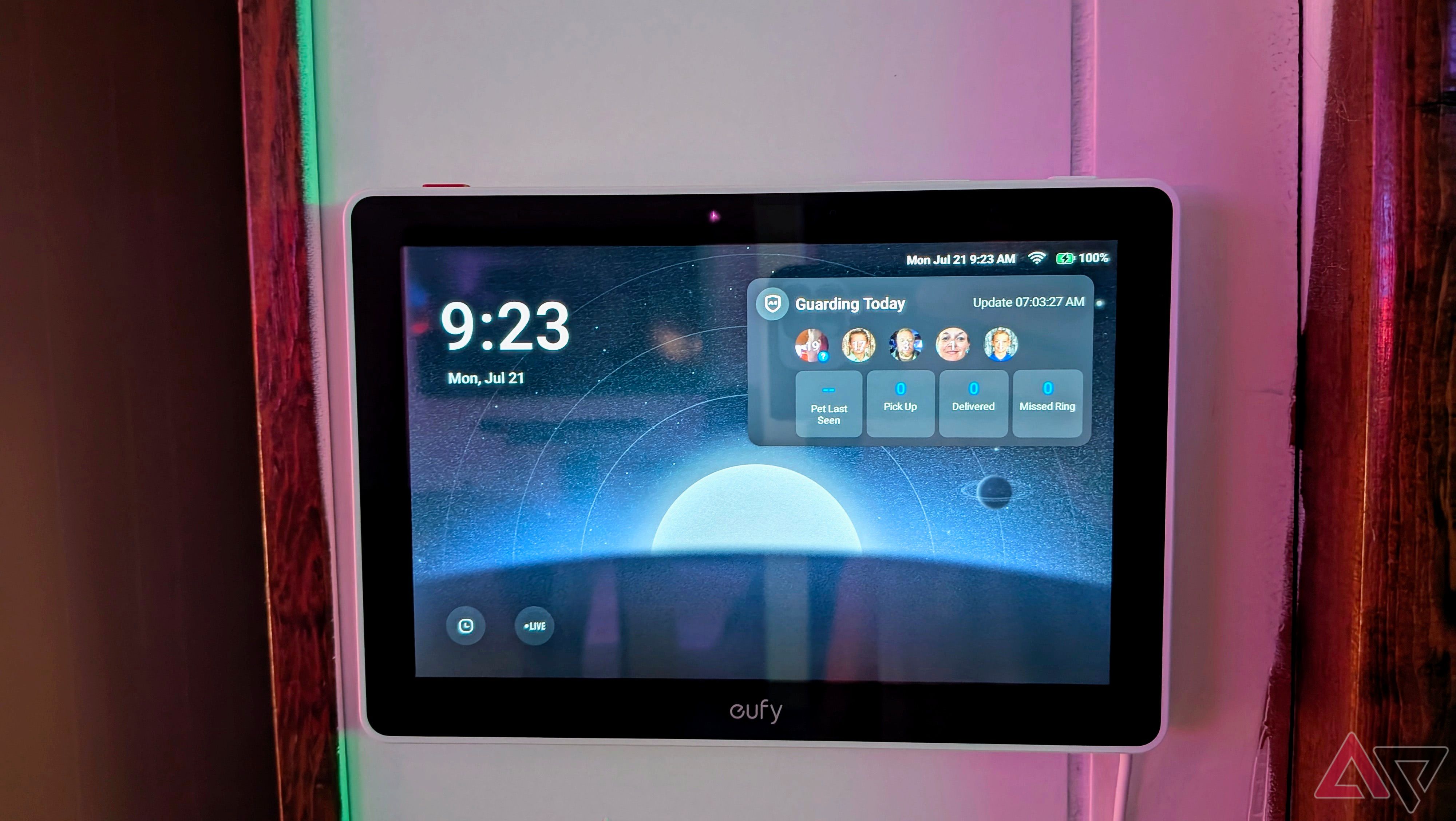 Eufy Smart Display E10 showing the home screen mounted on a wall.