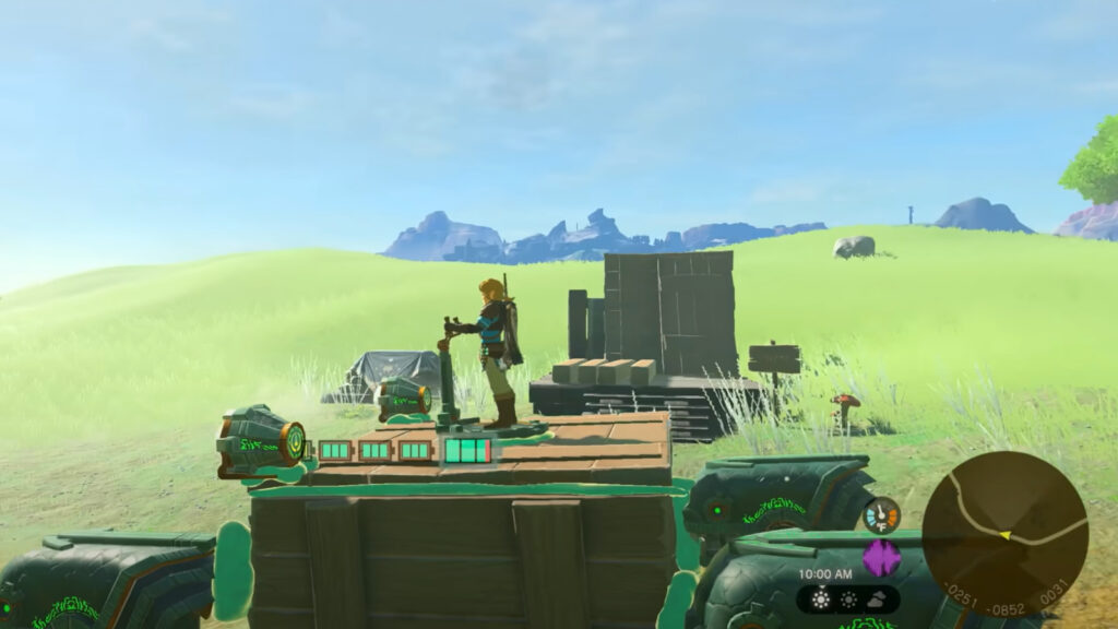 A character stands on a makeshift wooden vehicle in a vast, grassy landscape