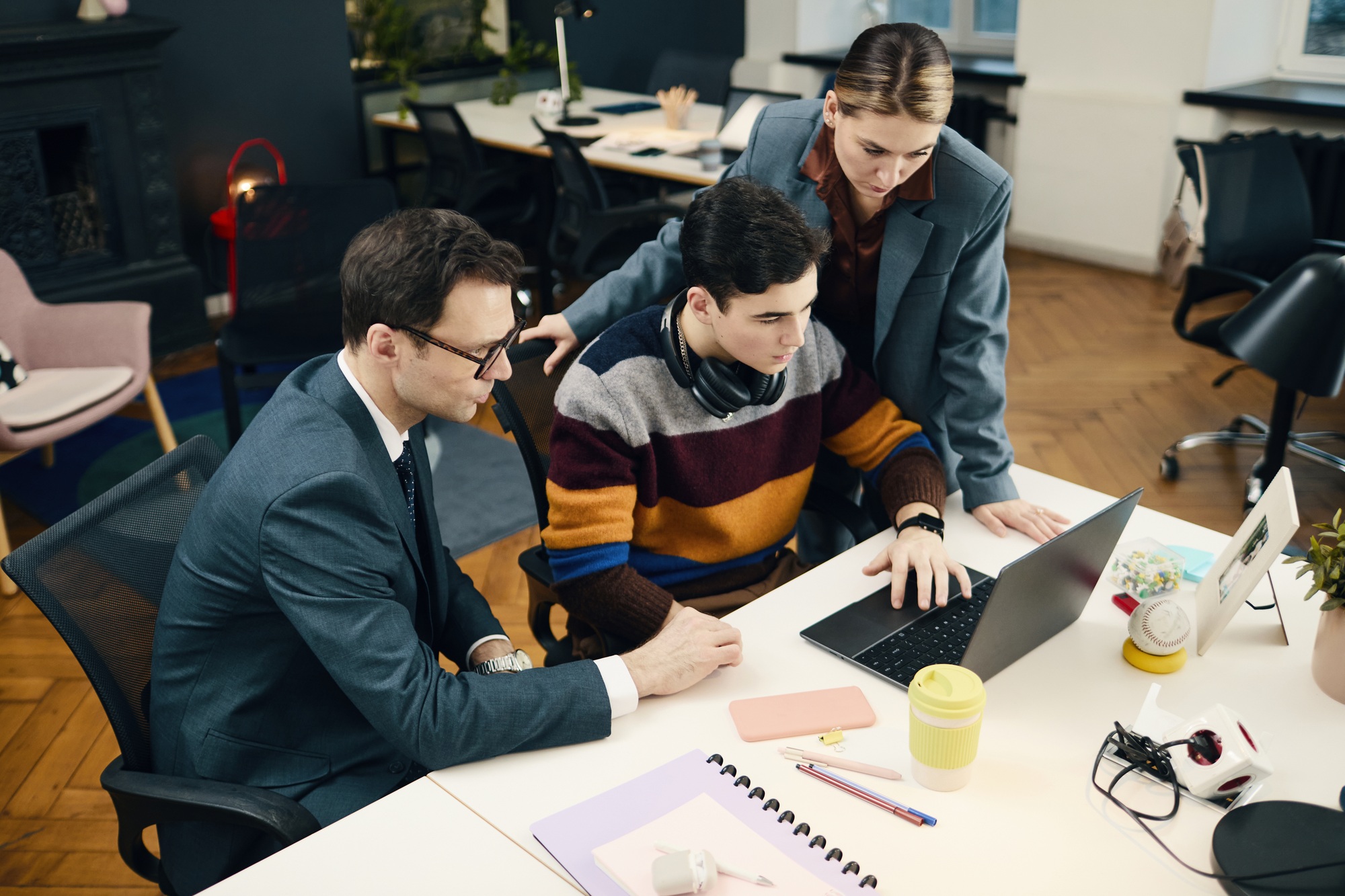 Business People Training Employee In Office