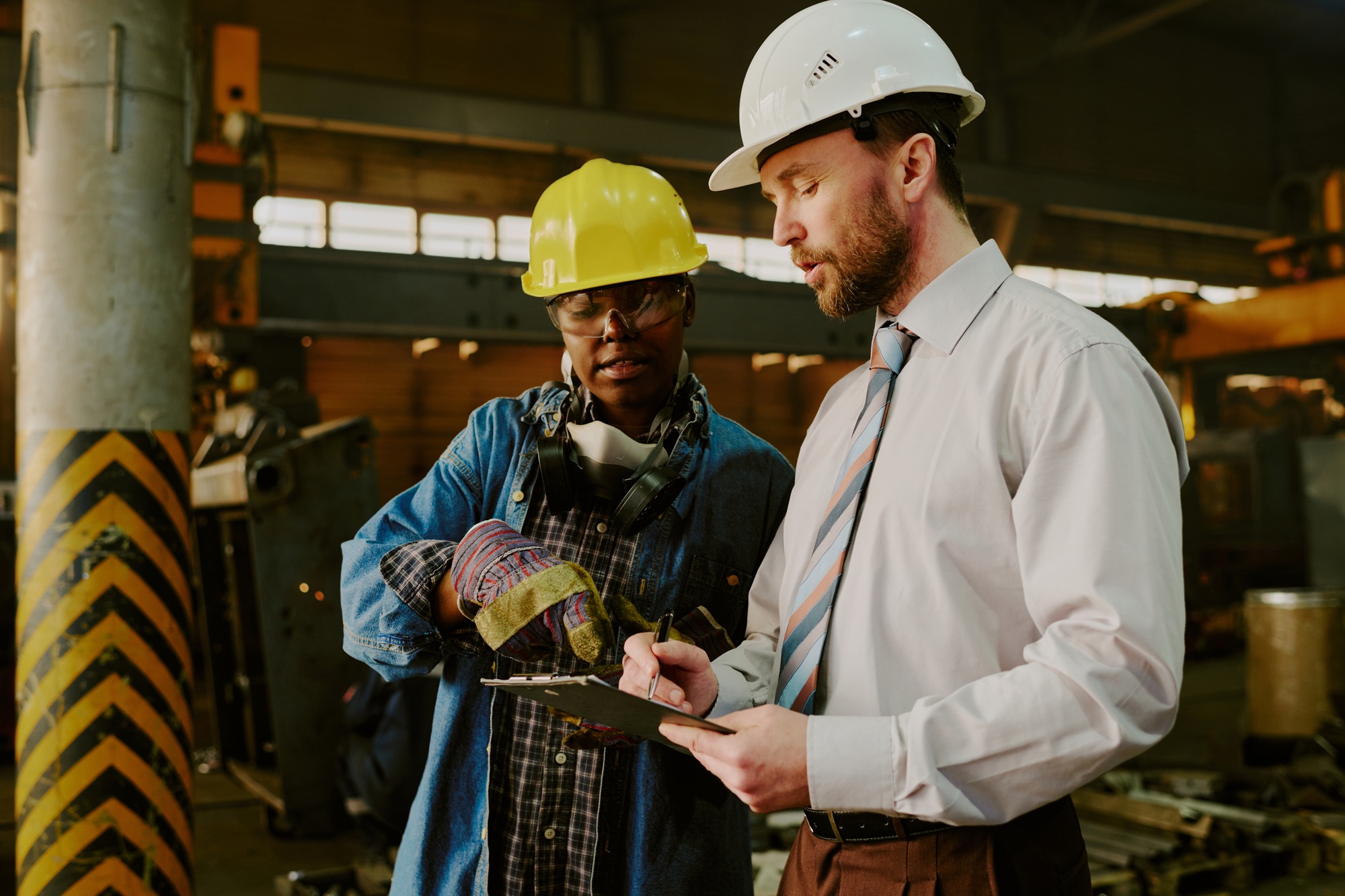 Two Factory Workers Doing Inventory