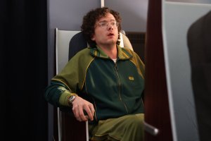 SATURDAY NIGHT LIVE -- Episode 1884 -- Pictured: Martin Herlihy during the PDD: First Class sketch on Saturday, May 17, 2025 -- (Photo by: Holland Rainwater/NBC)